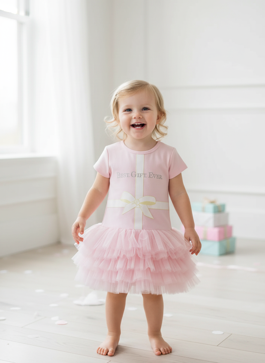 Toddler wearing pink Best Gift Ever dress