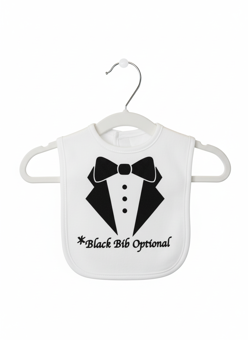 Close-up of white baby bib showing detailed tuxedo graphic with black bow tie, formal lapels, three buttons, and 'Black Bib Optional' text