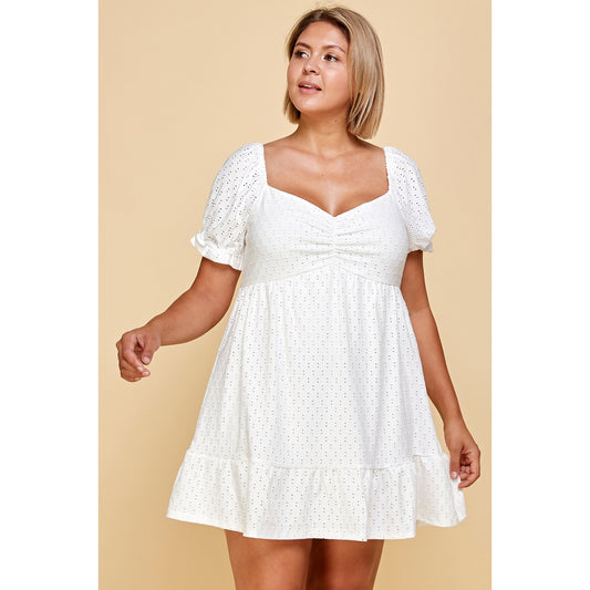 Plus size white eyelet babydoll dress front view – ruched sweetheart neckline and flowy tiered skirt on curvy women's summer dress