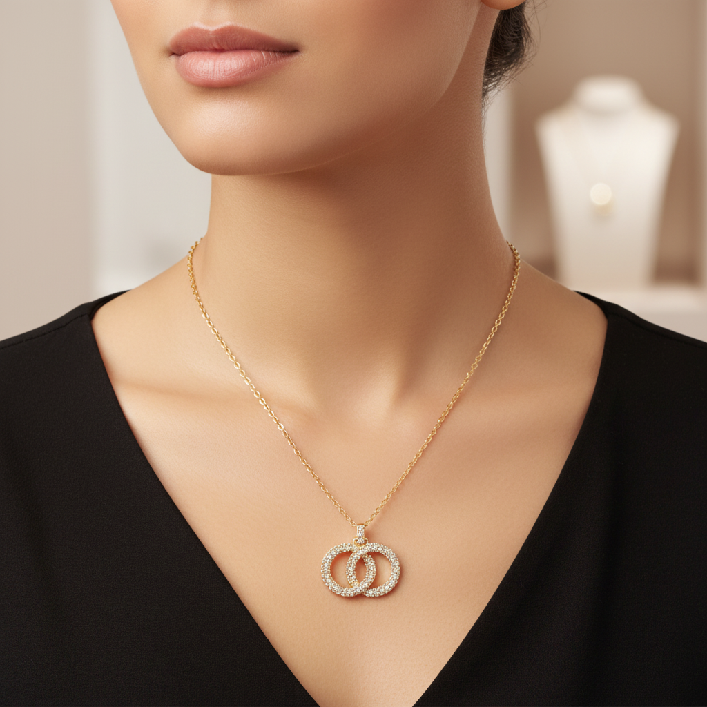 Woman wearing gold infinity necklace lifestyle shot